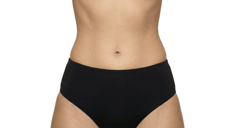 A close-up profile of a patient's flat, contoured abdomen following a tummy tuck surgery combined with advanced 360 liposuction to sculpt the waistline.